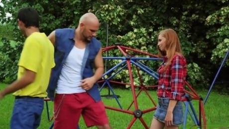 Bully fucks petite redhead in a park