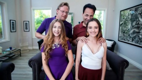 Video  Two teens Audrey Hempburne and Lily Glee are fucking with two dads